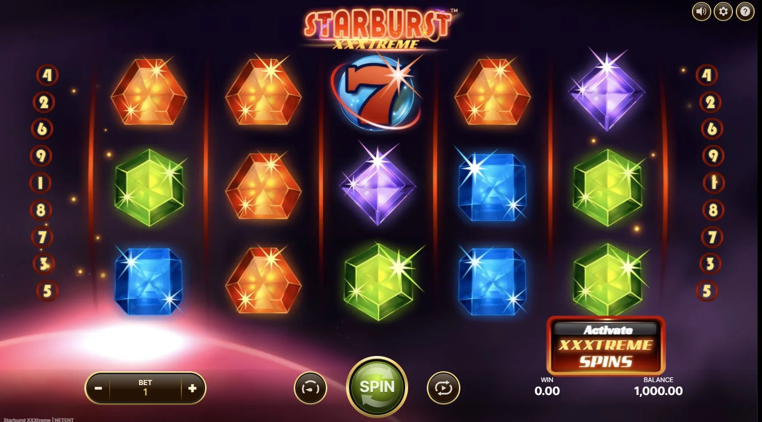 Starburst XXXtreme base game grid with gem symbols and 9 paylines numbered on each side
